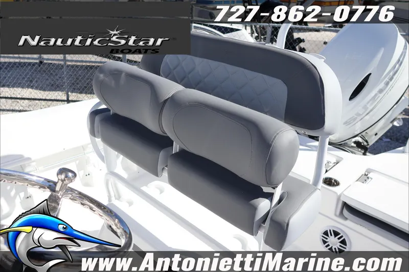 Slide: The Image of 2026 NauticStar 231 Hybrid boat seating with logo and contact details. - 27