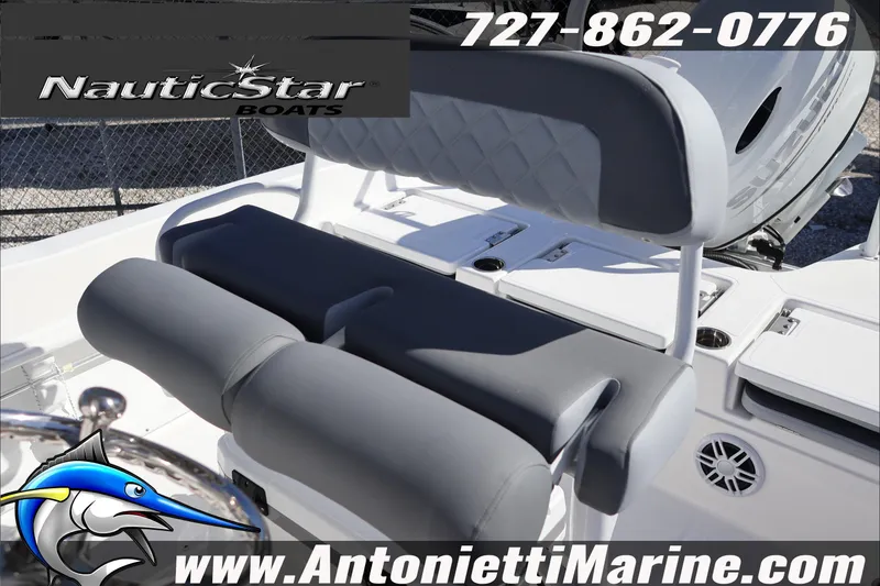 Slide: The Image of 2026 NauticStar 231 Hybrid boat interior with gray seating, showcased by Antonietti Marine. - 28