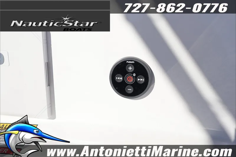 Slide: The Image of Control panel on 2026 NauticStar 231 Hybrid boat, featuring Fusion audio system. - 32