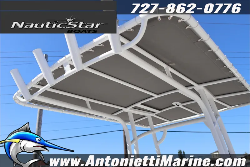 Slide: The Image of 2026 NauticStar 231 Hybrid boat canopy with contact details and website. - 37