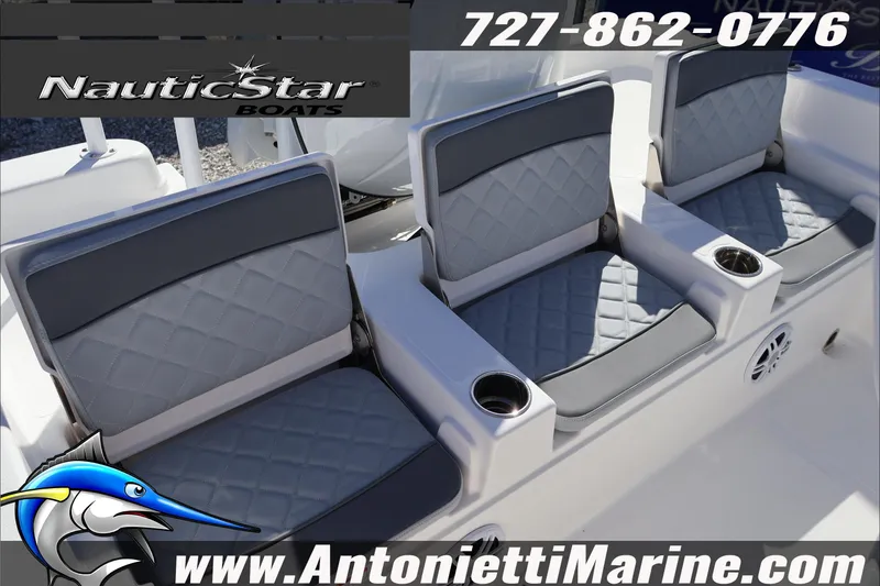 Slide: The Image of NauticStar 231 Hybrid 2026 boat seats with cup holders, displayed by Antonietti Marine. - 39