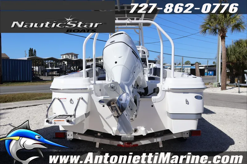 Slide: The Image of 2026 NauticStar 231 Hybrid boat displayed at Antonietti Marine dealership. - 4