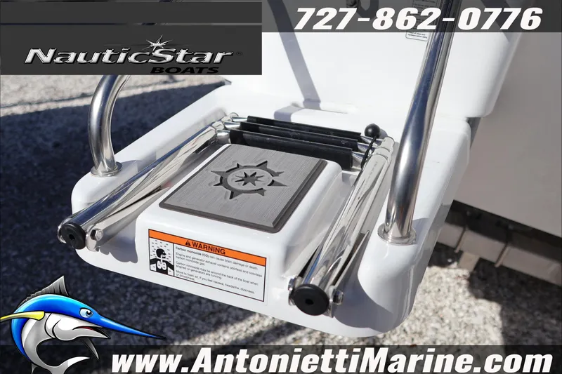 Slide: The Image of NauticStar 231 Hybrid 2026 boat ladder with logo and contact details. - 5