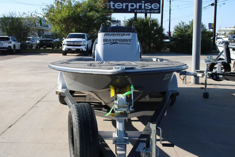 Slide: The Image of 2025 Mamba 227VX boat on trailer at dealership parking lot. - 15