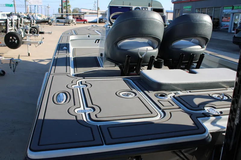 Slide: The Image of 2025 Mamba 227VX boat interior with dual seats and sleek deck design. - 4