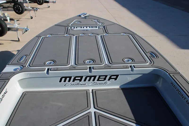 Slide: The Image of 2025 Mamba 227VX boat deck with custom design and logo. - 5