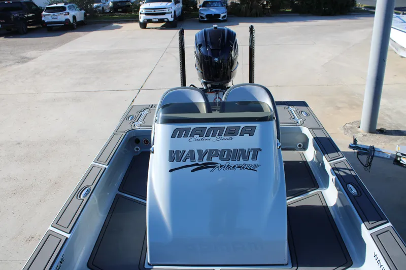 Slide: The Image of 2025 Mamba 227VX boat at Waypoint Marine dealership, rear view. - 7
