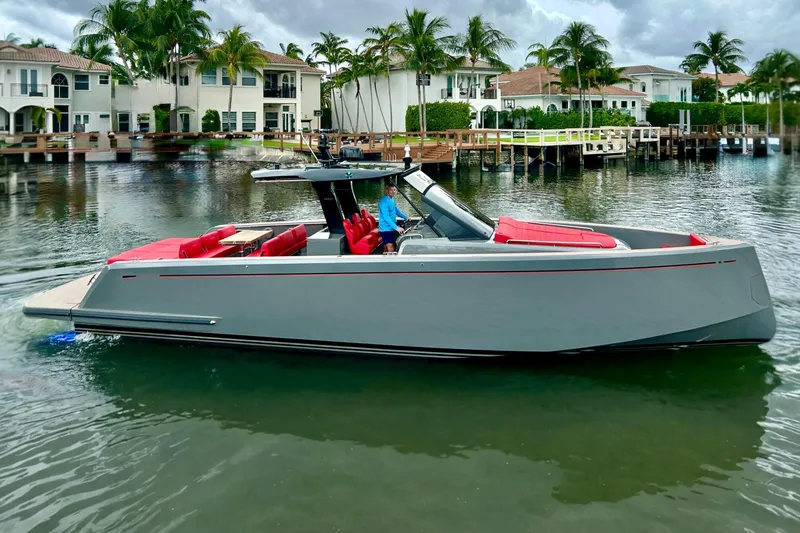 The Image of 2023 Pardo Yachts 43 in a scenic waterfront setting with luxury homes. - 0