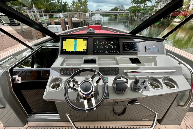 Slide: The Image of Helm of 2023 Pardo Yachts 43, featuring modern navigation and control systems. - 31