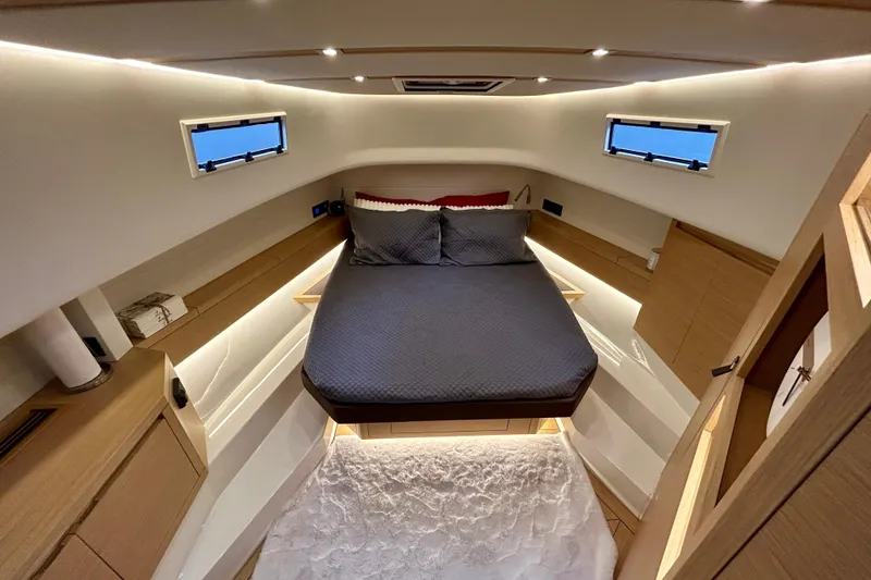 Slide: The Image of Luxurious cabin interior of 2023 Pardo Yachts 43, featuring modern design and cozy bedding. - 40