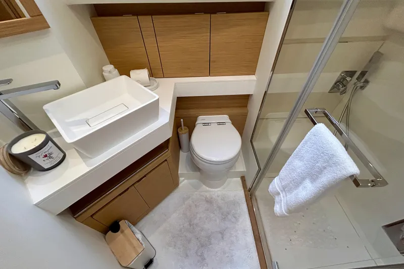 Slide: The Image of Modern bathroom in 2023 Pardo Yachts 43, featuring sleek fixtures and wooden accents. - 41