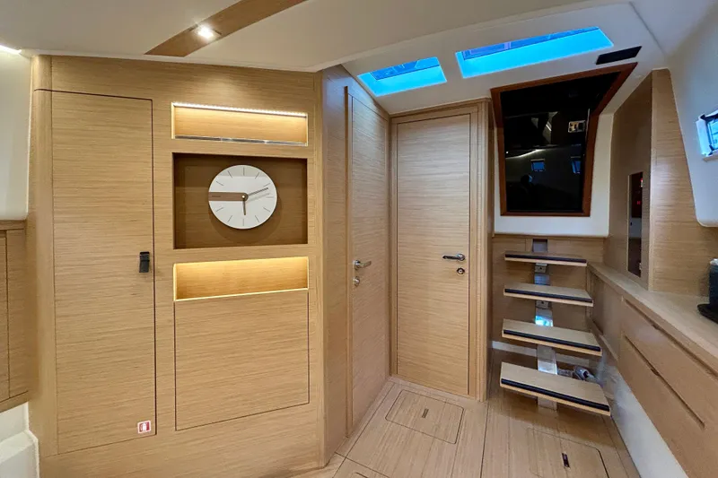 Slide: The Image of Luxurious interior of 2023 Pardo Yachts 43, featuring modern wood finish and skylights. - 33