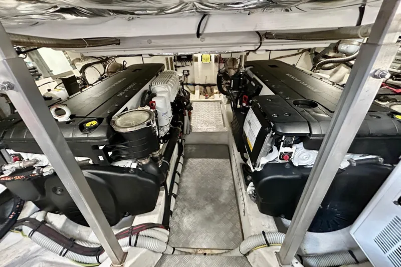 Slide: The Image of Engine room of 2023 Pardo Yachts 43, showcasing dual engines and mechanical components. - 49