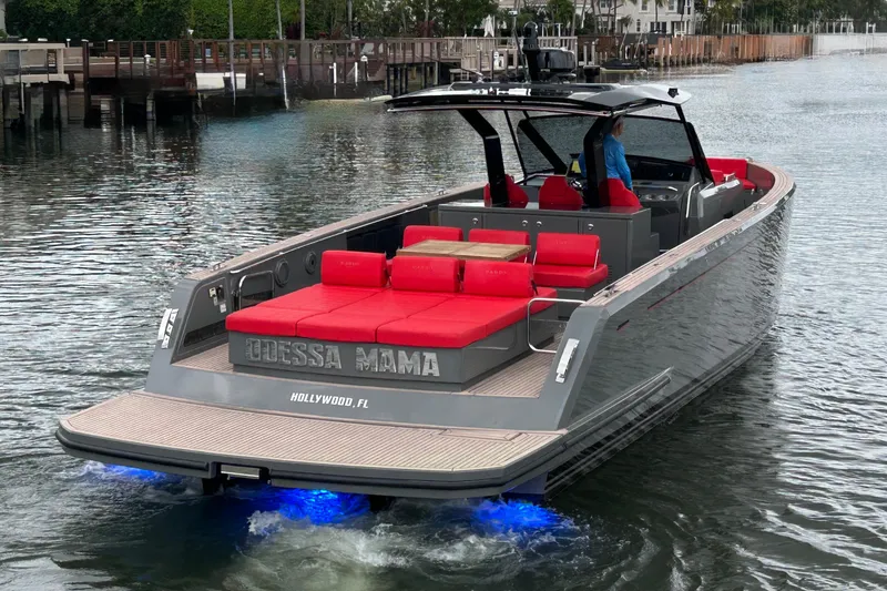 Slide: The Image of 2023 Pardo Yachts 43 with red seating, cruising in Hollywood, FL waters. - 6