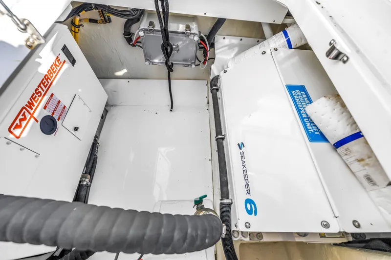 Slide: The Image of Engine room of 2023 HCB 53 Suenos RXV with Westerbeke and Seakeeper systems. - 102