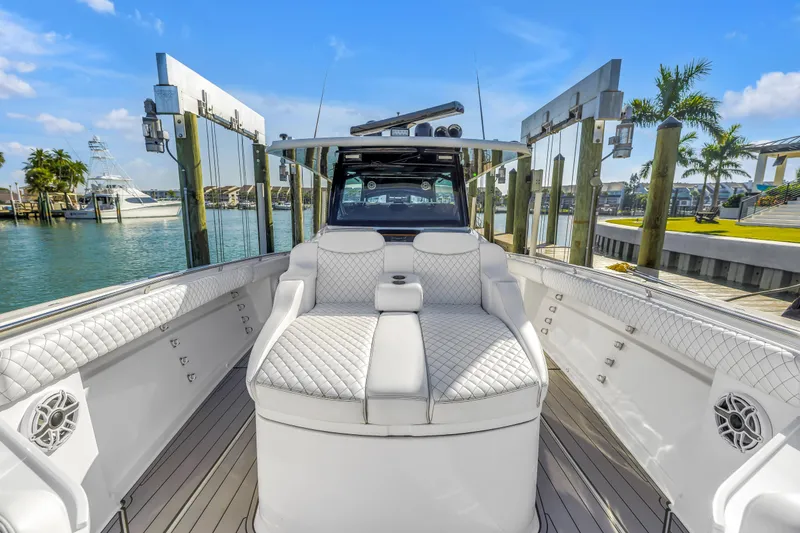 Slide: The Image of Luxurious 2023 HCB 53 Suenos RXV boat interior with plush seating and elegant design. - 27