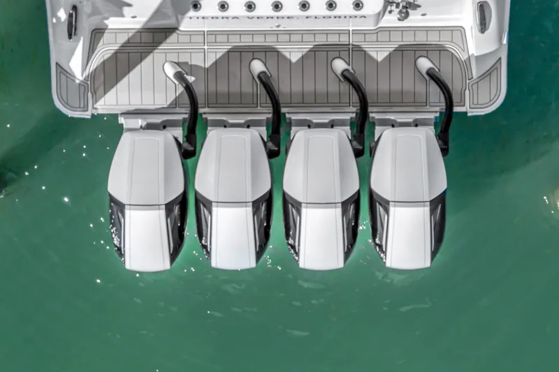 Slide: The Image of 2023 HCB 53 Suenos RXV boat with four powerful outboard engines. - 69