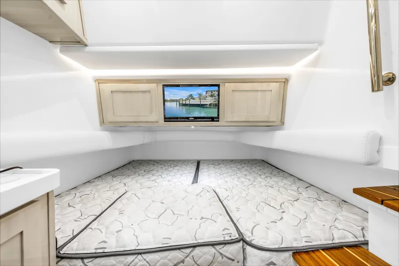 Slide: The Image of Interior cabin of 2023 HCB 53 Suenos RXV with bed and TV. - 89