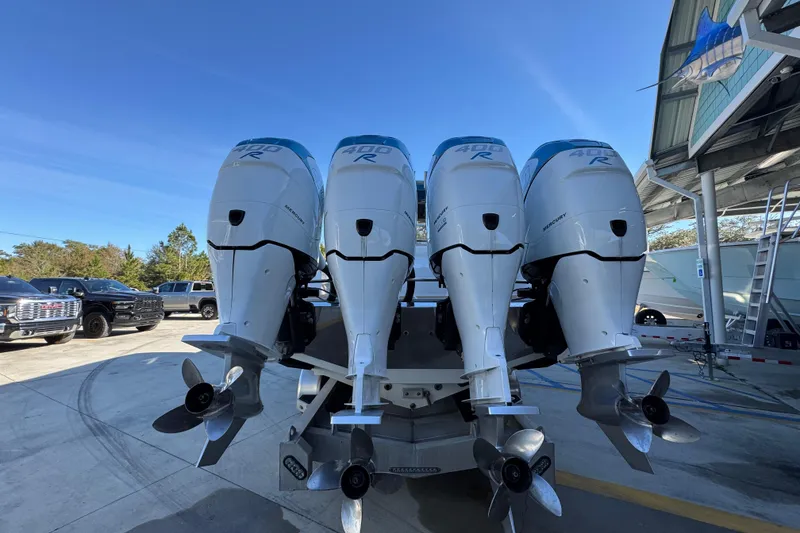 Slide: The Image of 2016 Nor-Tech 390 Sport Center Console with four powerful Mercury 400R outboard engines. - 15