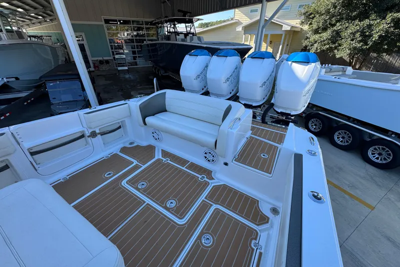 Slide: The Image of 2016 Nor-Tech 390 Sport Center Console with quad engines and spacious deck layout. - 41