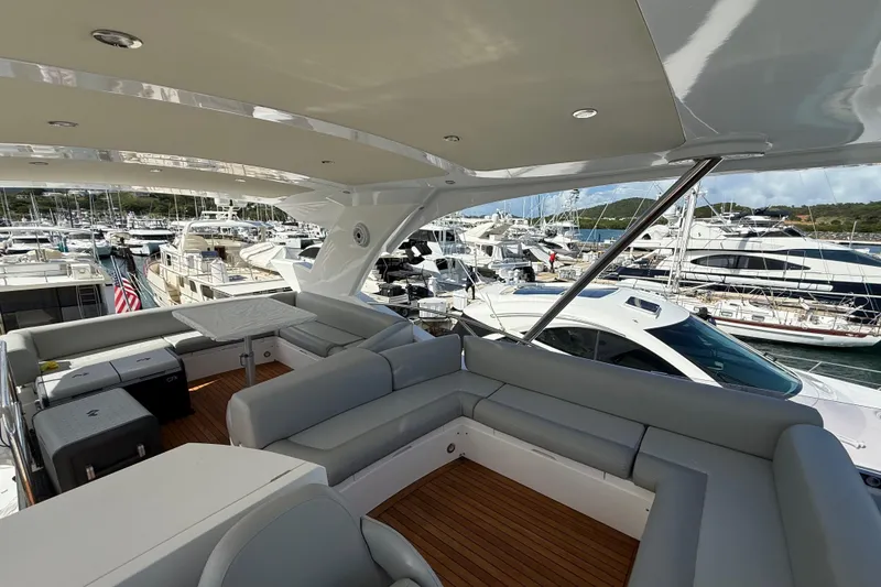 Slide: The Image of Luxurious 2017 Sunseeker Manhattan 65 yacht with spacious deck and elegant seating. - 11
