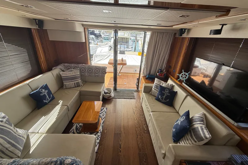 Slide: The Image of Luxurious interior of 2017 Sunseeker Manhattan 65 yacht with elegant seating and nautical decor. - 13