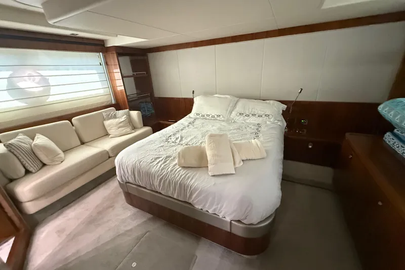 Slide: The Image of Luxurious bedroom interior of 2017 Sunseeker Manhattan 65 yacht with cozy bed and sofa. - 18