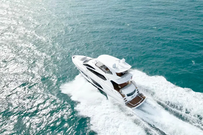Slide: The Image of 2017 Sunseeker Manhattan 65 yacht cruising on open sea. - 3