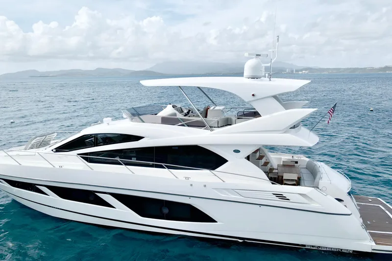 Slide: The Image of Luxury 2017 Sunseeker Manhattan 65 yacht cruising on open sea. - 5