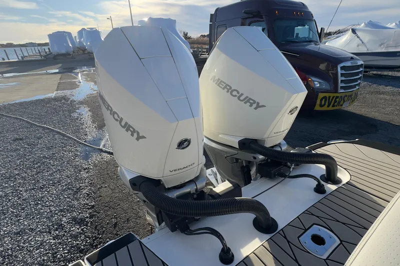 Slide: The Image of 2026 Sea Ray SLX 280 with Mercury Verado outboard engines. - 11