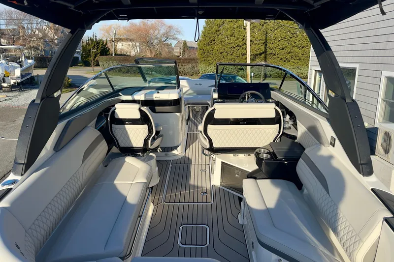 Slide: The Image of Interior of 2026 Sea Ray SLX 280 Outboard with luxurious seating. - 17