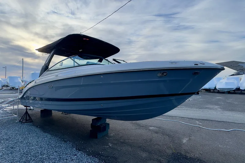 Slide: The Image of 2026 Sea Ray SLX 280 Outboard boat elevated outdoors. - 2