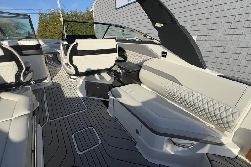 Slide: The Image of Interior of 2026 Sea Ray SLX 280 Outboard with luxurious seating. - 22