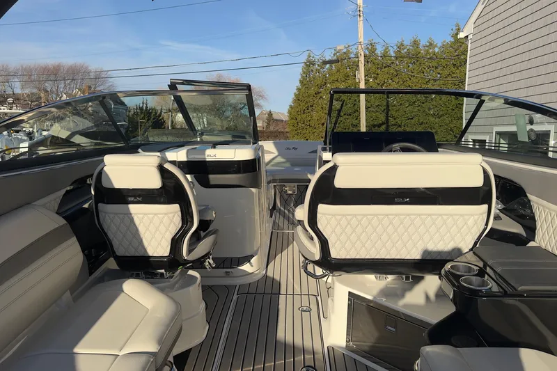 Slide: The Image of Interior of 2026 Sea Ray SLX 280 Outboard with luxurious seating. - 25