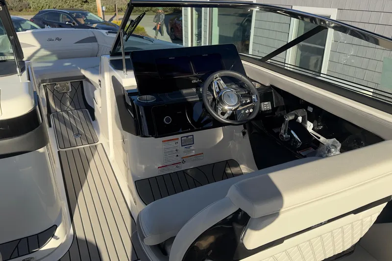 Slide: The Image of Interior of 2026 Sea Ray SLX 280 Outboard with modern helm. - 26