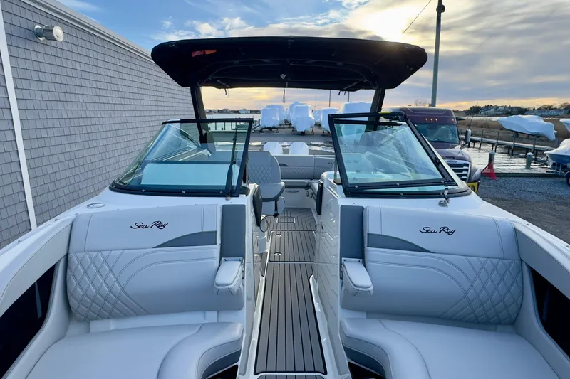 Slide: The Image of 2026 Sea Ray SLX 280 Outboard with luxurious interior at dock. - 38