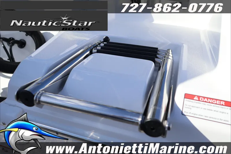 Slide: The Image of 2026 NauticStar 222 Offshore boat ladder with branding and contact information. - 11