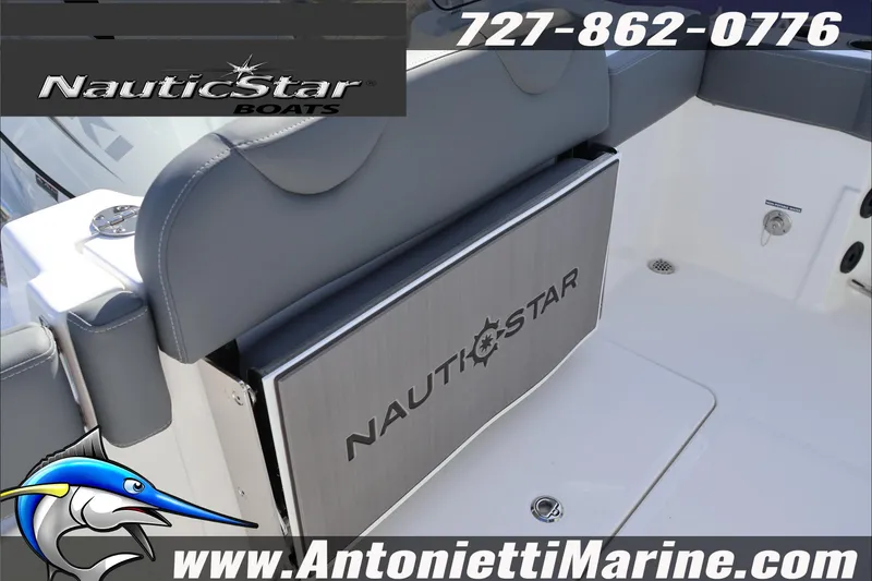 Slide: The Image of 2026 NauticStar 222 Offshore boat interior with logo and contact details. - 17