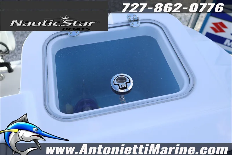 Slide: The Image of 2026 NauticStar 222 Offshore boat detail with contact info and logo. - 20