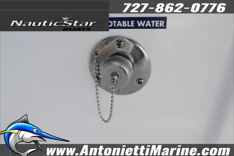 Slide: The Image of 2026 NauticStar 222 Offshore boat potable water inlet with contact details. - 21