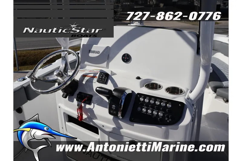 Slide: The Image of 2026 NauticStar 222 Offshore boat dashboard with steering wheel and controls. - 27