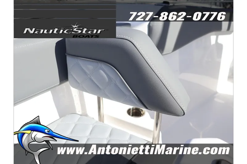Slide: The Image of 2026 NauticStar 222 Offshore boat seat detail with contact info and logo. - 36