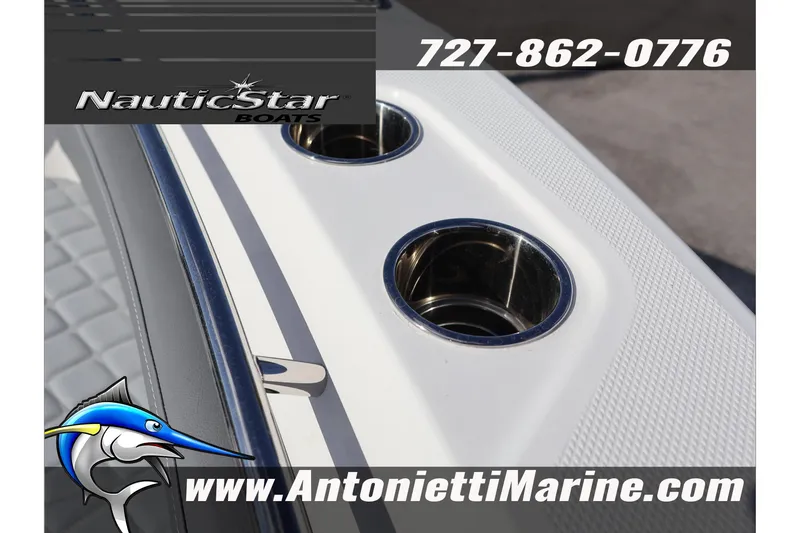 Slide: The Image of 2026 NauticStar 222 Offshore boat detail with cup holders, Antonietti Marine branding. - 42