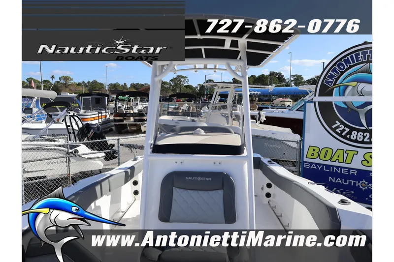 Slide: The Image of 2026 NauticStar 222 Offshore boat displayed at Antonietti Marine dealership. - 45