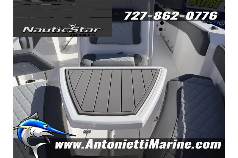 Slide: The Image of 2026 NauticStar 222 Offshore boat interior with seating and table, Antonietti Marine branding. - 46