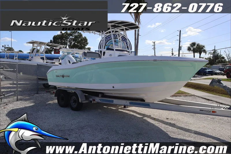 Slide: The Image of 2026 NauticStar 222 Offshore boat on trailer at Antonietti Marine dealership. - 5