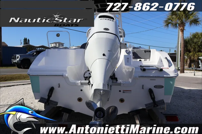 Slide: The Image of 2026 NauticStar 222 Offshore boat displayed at Antonietti Marine dealership. - 7