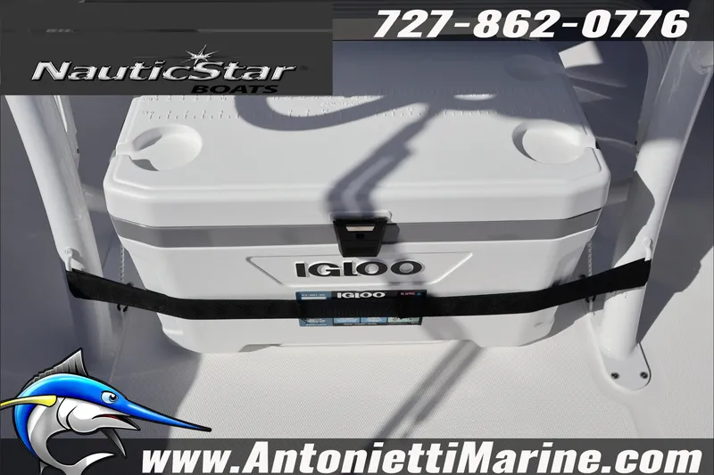 Slide: The Image of 2026 NauticStar 222 Offshore boat with Igloo cooler, contact info, and website displayed. - 17