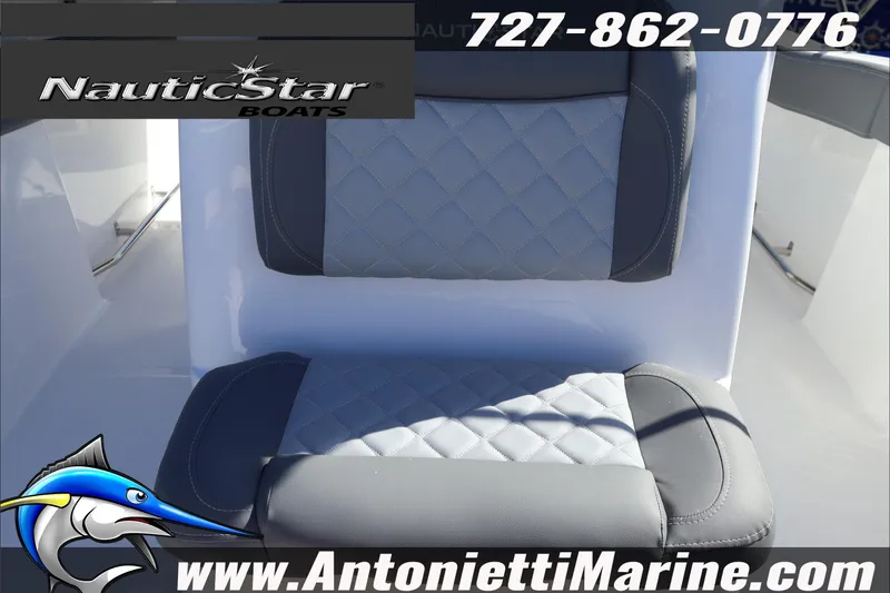 Slide: The Image of Quilted seating on 2026 NauticStar 222 Offshore boat, featuring branding and contact details. - 32