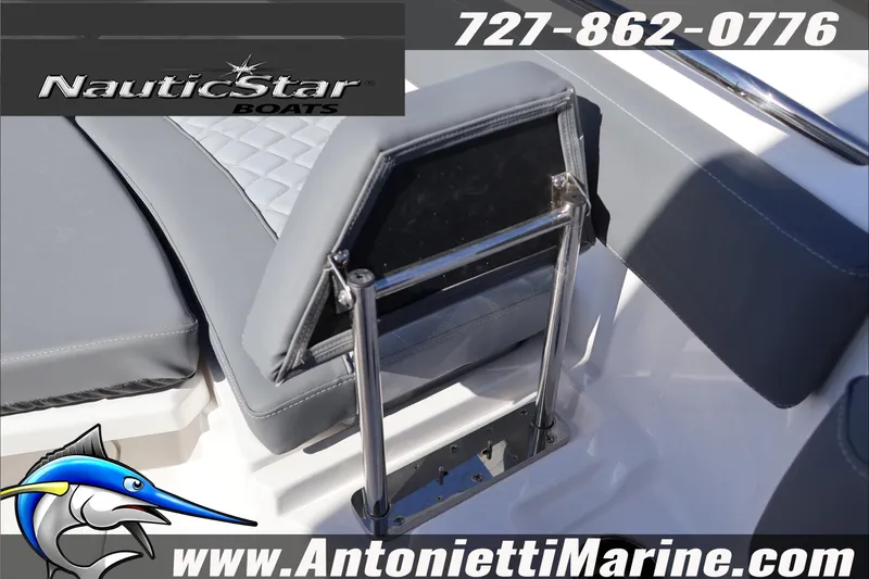 Slide: The Image of 2026 NauticStar 222 Offshore boat interior with seating and logo details. - 37